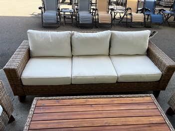 Light Brown PVC Wicker Sofa with Beige Cushions