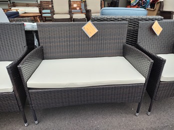 Outdoor Harris Dark Brown PVC Wicker Loveseat with White Seat Cushion