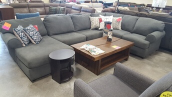 Ashley Plush Charcoal Fabric Sectional with Rolled Arms