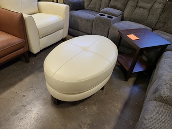 Violino Ivory Oval Ottoman with Stitched Accents