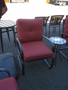 Outdoor Chocolate Metal Chair with Curved Arms & Orange Seat Cushions