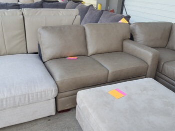 Chateau Dax Taupe Leather One-Arm Loveseat